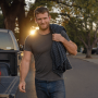 A One-Day Jober walking home at the end of a paid day in Austin
